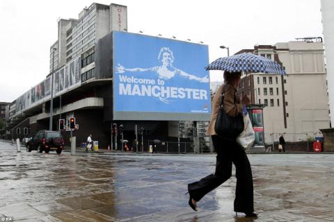 tevez billboard in manchester